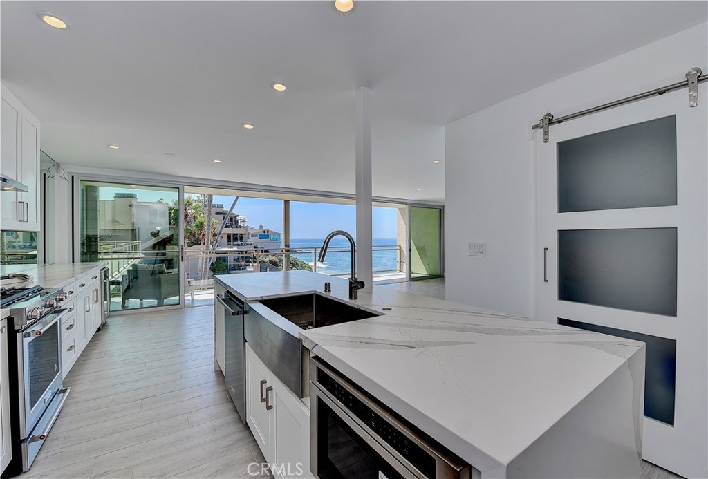 Huge open kitchen with sweeping ocean views. - 1585 S Coast Highway 42, Laguna Beach CA 92651 - photo 1
