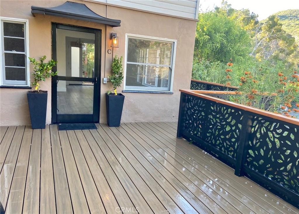 New Trex deck wraps around two sides of the house. - 160 High, C Drive, Laguna Beach CA 92651 - photo 1