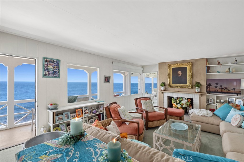 The main residence features three bedrooms and three bathrooms, while a detached guest residence offers two bedrooms and - 1665 Viking Road, Laguna Beach CA 92651 - photo 6