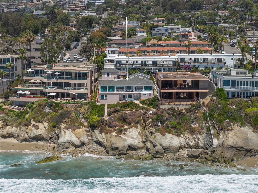 The wide-frontage home site delivers expansive ocean exposure and the kind of unobstructed views that have become nearly - 1665 Viking Road, Laguna Beach CA 92651 - photo 11