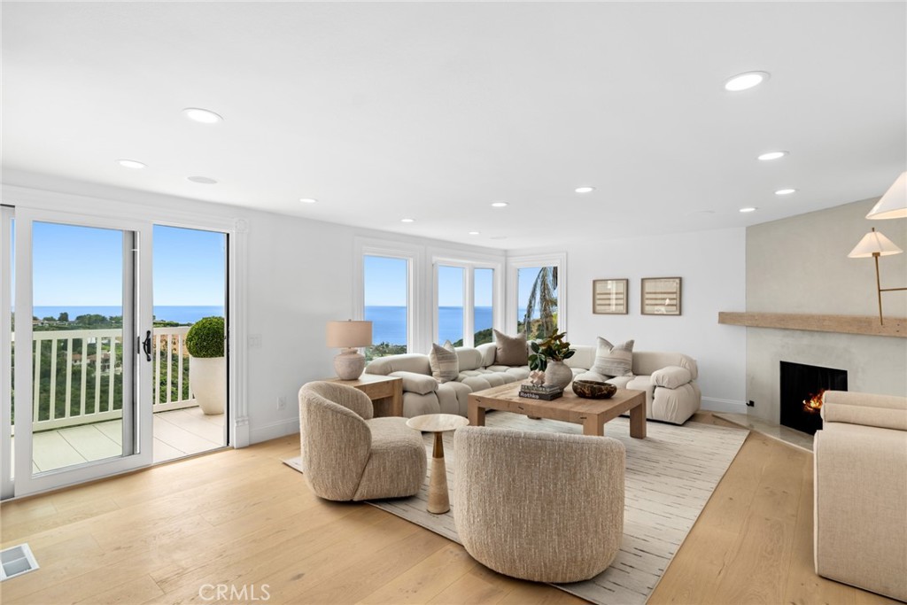 Whether enjoying vibrant sunsets over the water or relaxing by the fireplace on cooler coastal evenings, the home offers - 1675 Tahiti Avenue, Laguna Beach CA 92651 - photo 19
