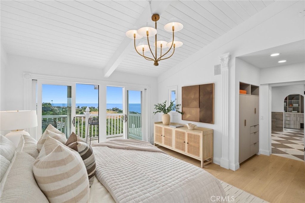 The upper level includes four spacious bedrooms and a laundry room. - 1675 Tahiti Avenue, Laguna Beach CA 92651 - photo 21