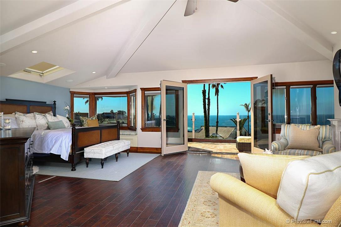 The master bedroom is the ultimate in luxury as you gaze out to the Pacific Ocean. - 17 S La Senda Drive, Laguna Beach CA 92651 - photo 1