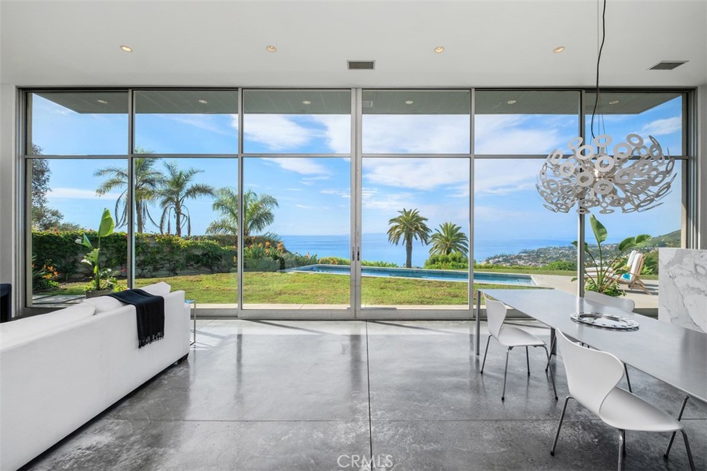The living area is filled with beautiful views from all directions. - 1704 Thurston Drive, Laguna Beach CA 92651 - photo 1