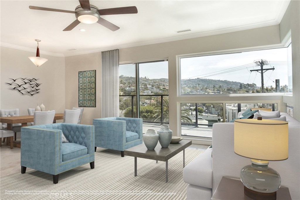 This photo shows a decorating idea. The picture is virtually staged. Please see next photo which shows room without furn - 174 Cliff Drive C, Laguna Beach CA 92651 - photo 1
