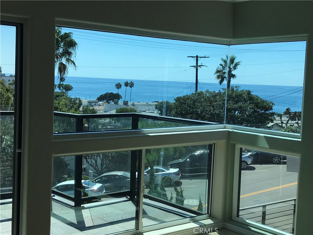 Gorgeous ocean views from living area, kitchen, dining room, and large balcony! - 174 Cliff Drive C, Laguna Beach CA 92651 - photo 1