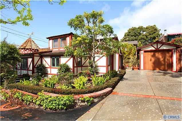 Lush landscaping complements this bungalow-style cottage! - 1762 GLENNEYRE Street, Laguna Beach CA 92651 - photo 1
