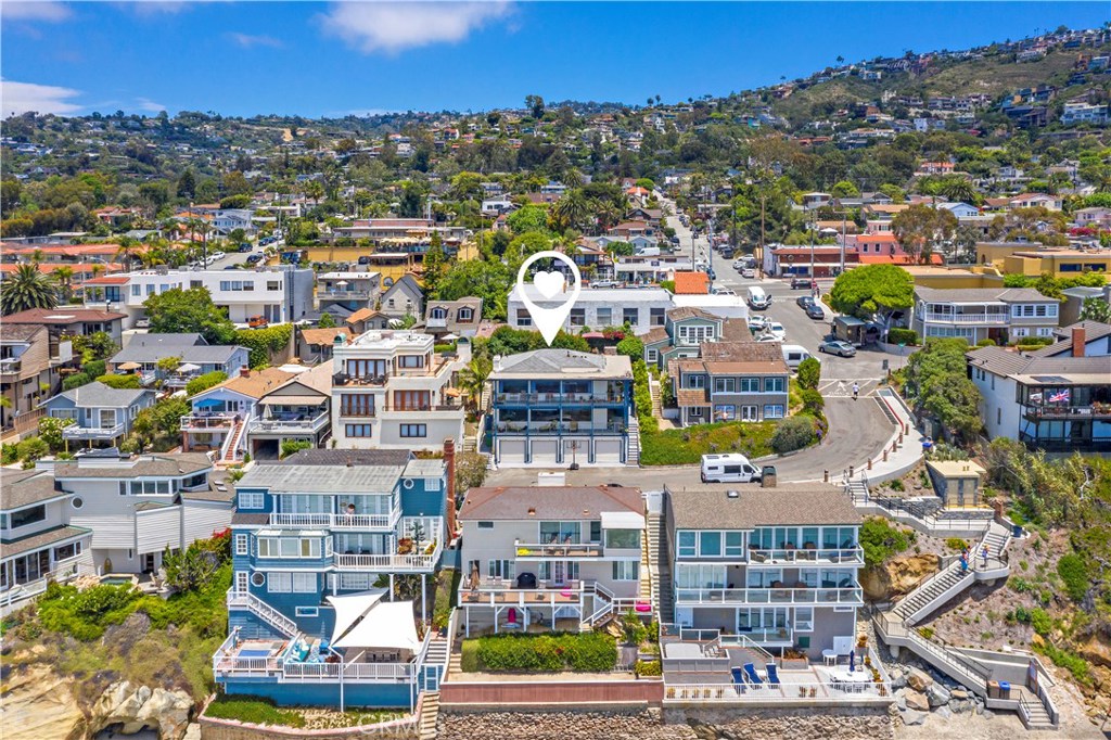 Perfectly positioned in the heart of Woods Cove, adjacent to the newly rebuilt stairs to the beach at Pearl Street. - 1782 Ocean Way, Laguna Beach CA 92651 - photo 1