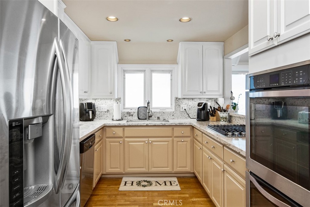 Kitchen with Granite Counter/ Stainless Steel appliances - 181 SUNSET Terrace, Laguna Beach CA 92651 - photo 43