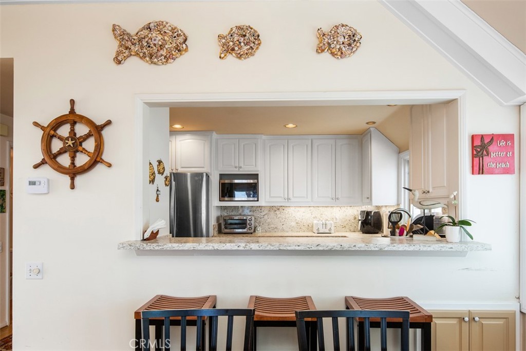Countertop bar to Kitchen - 181 SUNSET Terrace, Laguna Beach CA 92651 - photo 45