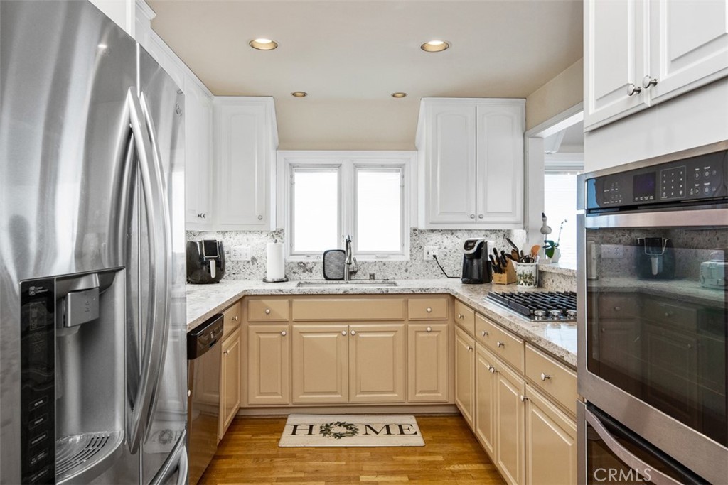 Kitchen with Granite Counter/ Stainless Steel appliances - 181 SUNSET Terrace, Laguna Beach CA 92651 - photo 43