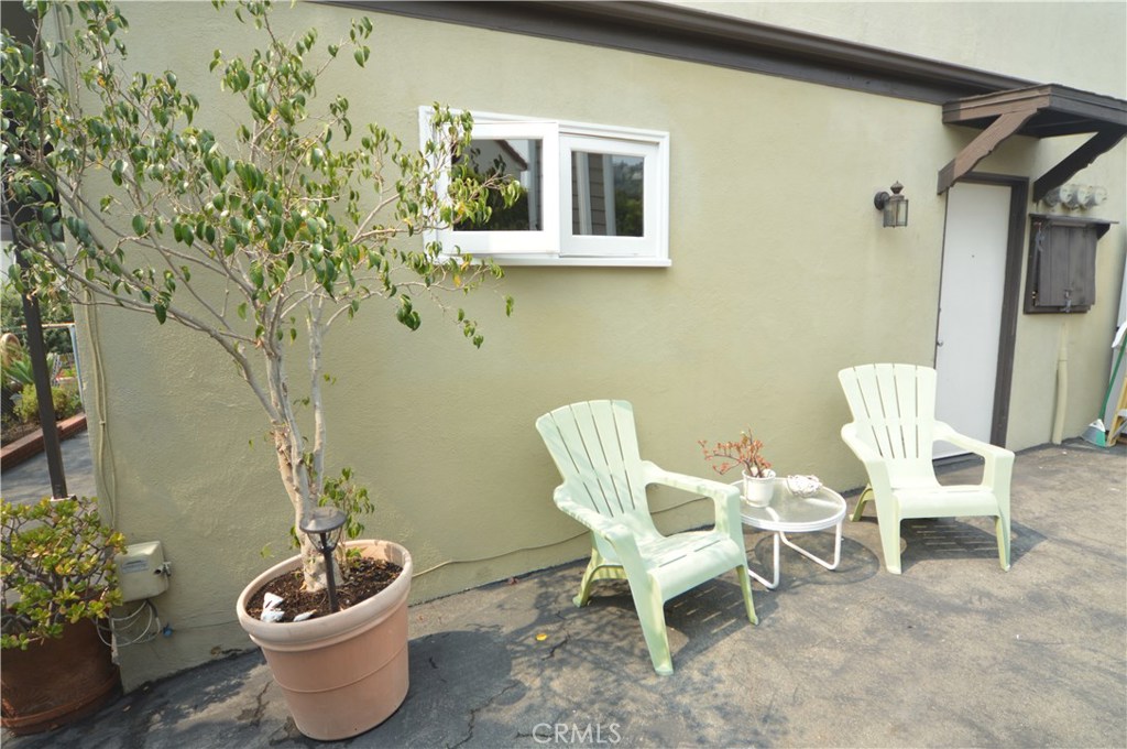 Your private patio for simply relaxing or puttering around with some nice potted plants. - 1831 1/2 Glenneyre Street, Laguna Beach CA 92651 - photo 1