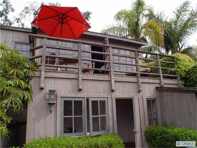 2 Story freestanding farmhouse style cottage with balcony and deck patio with views. - 1947 RIM ROCK CANYON Road, Laguna Beach CA 92651 - photo 1