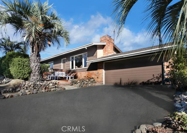 Front of home with driveway and additional on-street parking - 1961 Temple Hills Drive, Laguna Beach CA 92651 - photo 1