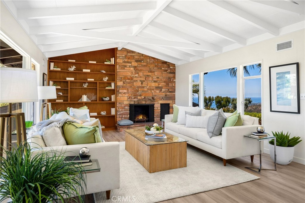 Living room with an ocean & hillside view. - 1961 Temple Hills Drive, Laguna Beach CA 92651 - photo 1
