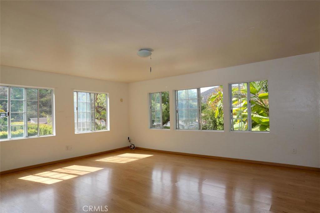 No shared walls - just someone below. Enjoy views of trees and canyon - 208 Canyon Acres C, Laguna Beach CA 92651 - photo 1