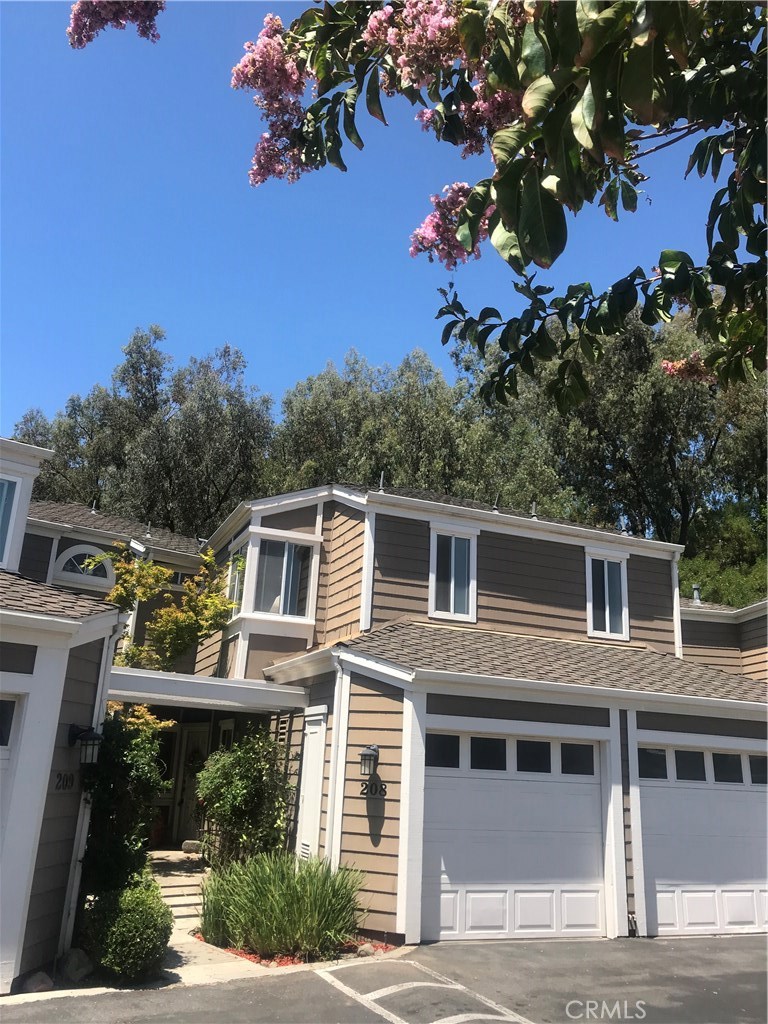 Front View of 208 Santa Rosa Court with Direct Access Attached Garage. - 208 Santa Rosa Court 208, Laguna Beach CA 92651 - photo 1