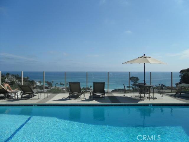 Breathtaking Ocean views abound from one of the most beautiful pools in all of Laguna Beach! Bring your towel and relax. - 21641 Wesley Drive B, Laguna Beach CA 92651 - photo 1
