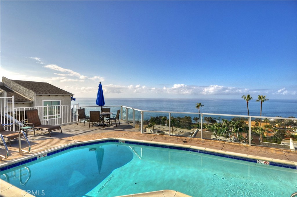 Enjoy spectacular Ocean and Sunset views from the rooftop pool. An amazing location to enjoy coastal living at it's best - 21651 Ocean Vista Drive 11, Laguna Beach CA 92651 - photo 1