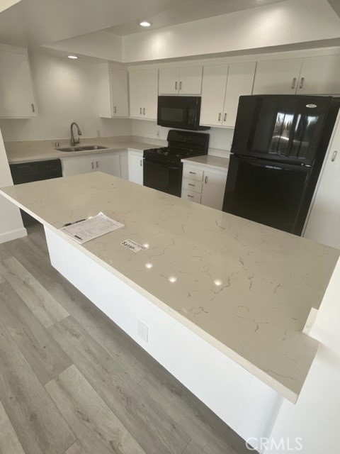 Island open to kitchen - 217 Dolphin Way E, Laguna Beach CA 92651 - photo 7