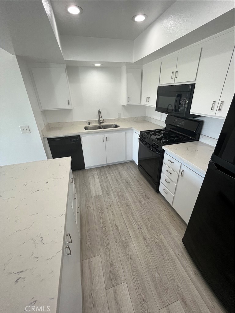 Kitchen with lots of cabinets - 217 Dolphin Way E, Laguna Beach CA 92651 - photo 9