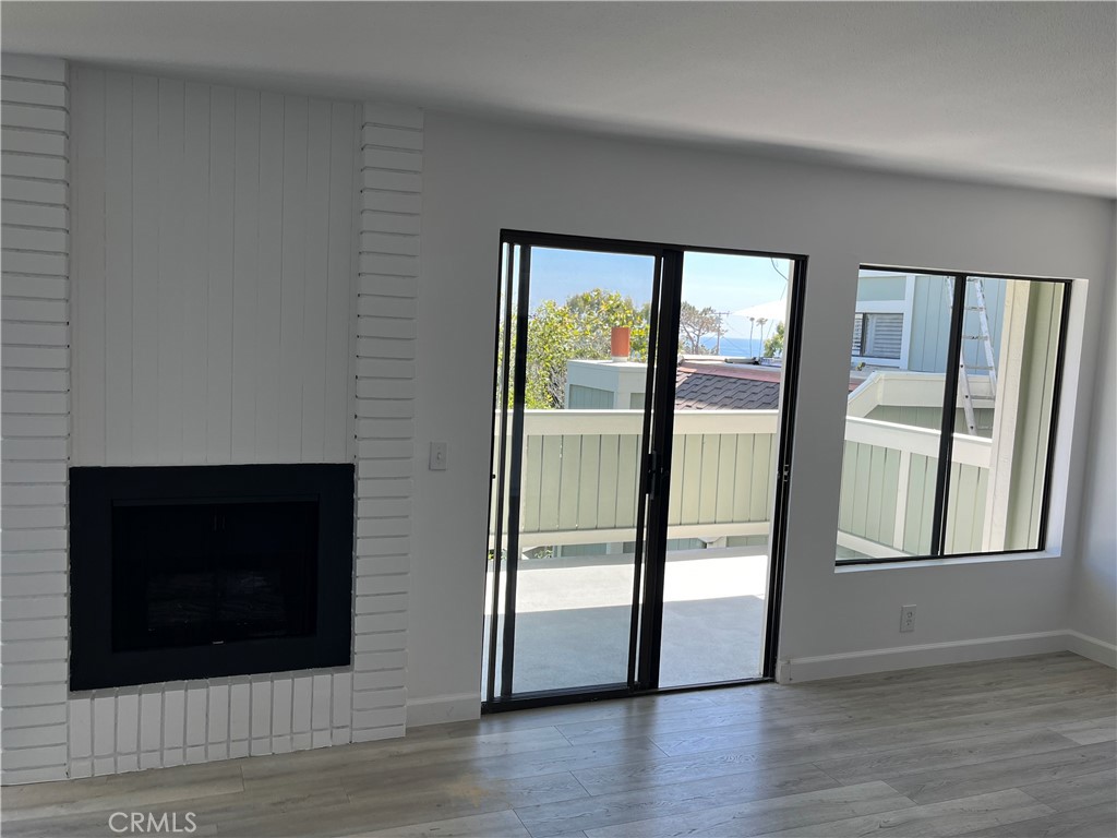 Entry to Deck off of living room - 217 Dolphin Way E, Laguna Beach CA 92651 - photo 16