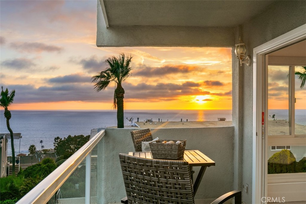 Beautiful sunset views - 21703 Ocean Vista Drive 204-A, Laguna Beach CA 92651 - photo 1