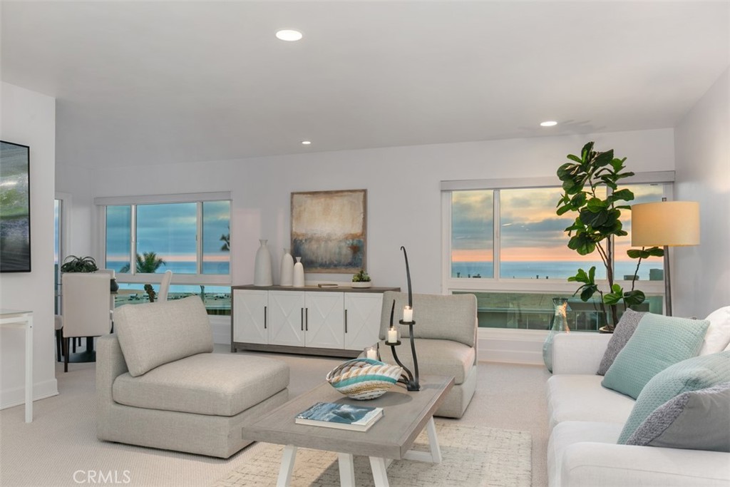Wow, look at the ever-changing colors at sunset. - 21703 Ocean Vista Drive 204, Laguna Beach CA 92651 - photo 1