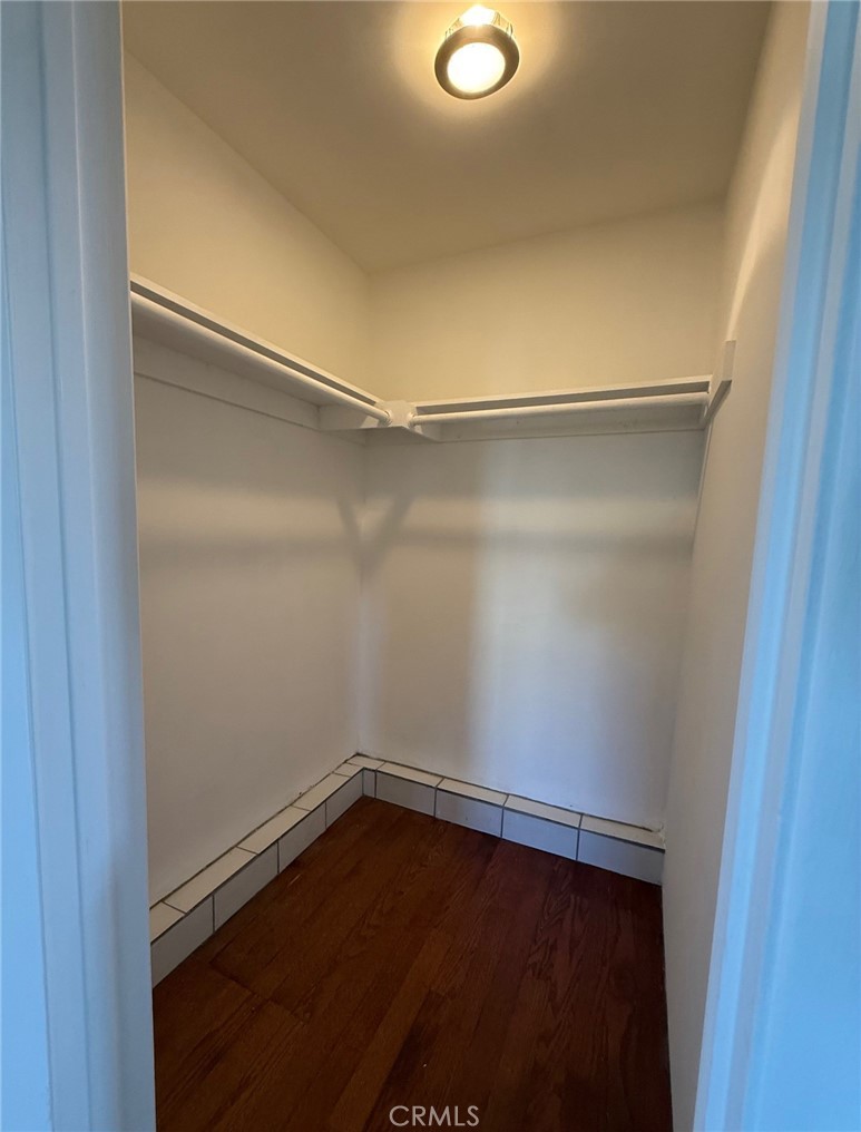Secondary bedroom has a large walk-in closet. - 21712 # 2 Wesley Drive, Laguna Beach CA 92651 - photo 14