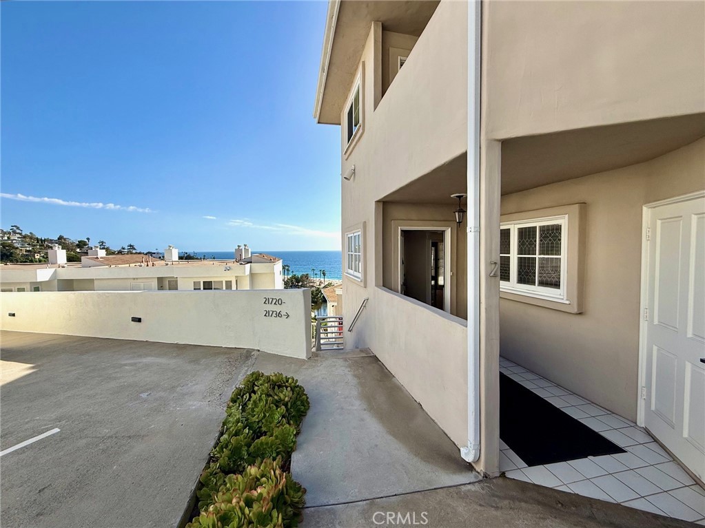 Corner home! Walk from covered parking to your single level home without a single stair. - 21712 # 2 Wesley Drive, Laguna Beach CA 92651 - photo 16