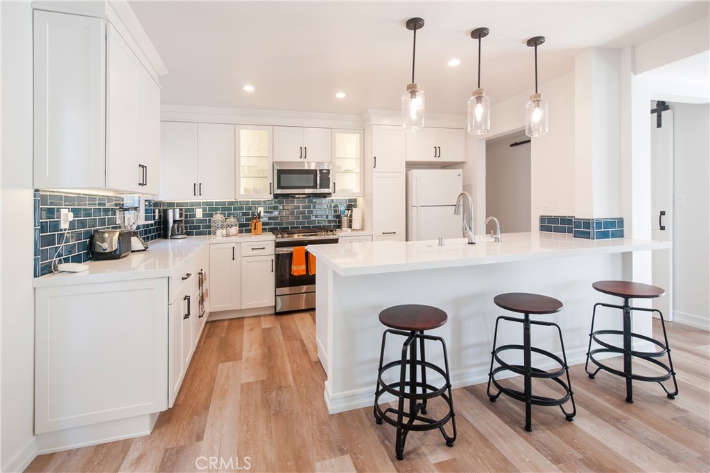 Kitchen with island seating - 2172 Ocean Way, Laguna Beach CA 92651 - photo 1