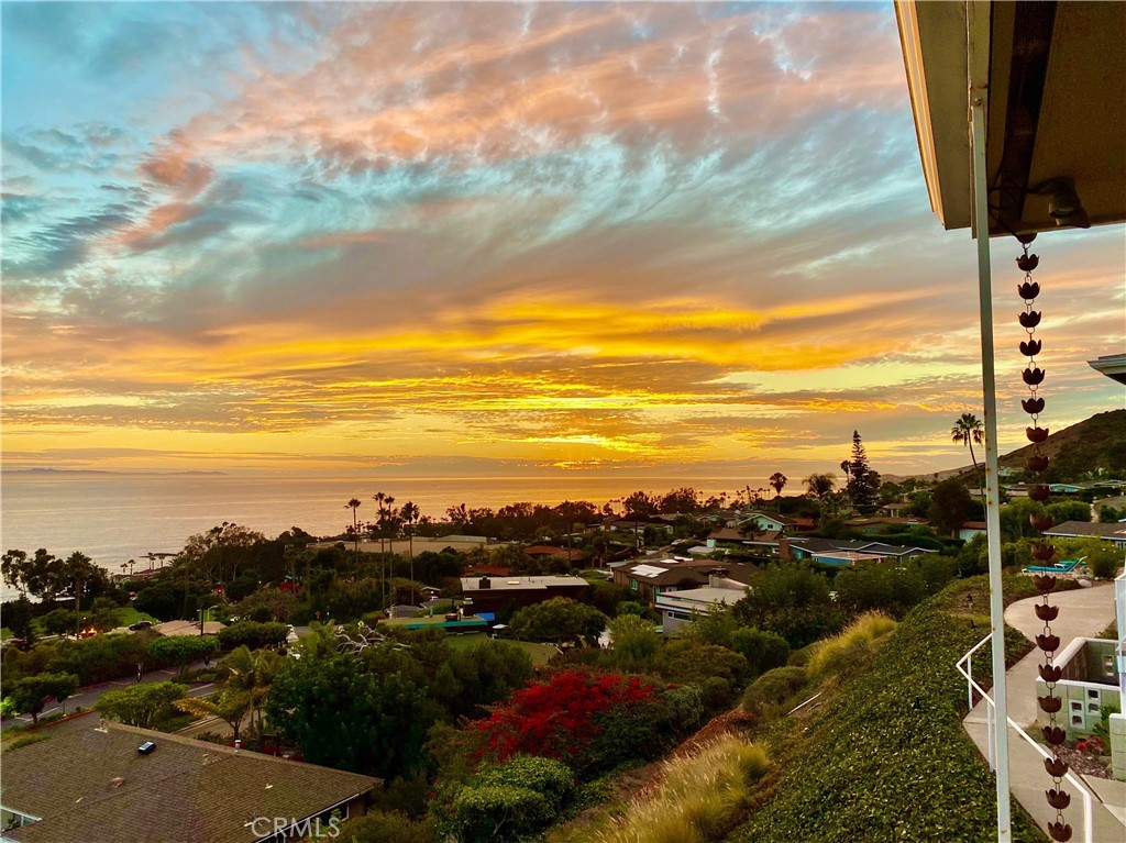 Sunset skies from the condo. - 21722 Ocean Vista Drive E, Laguna Beach CA 92651 - photo 1