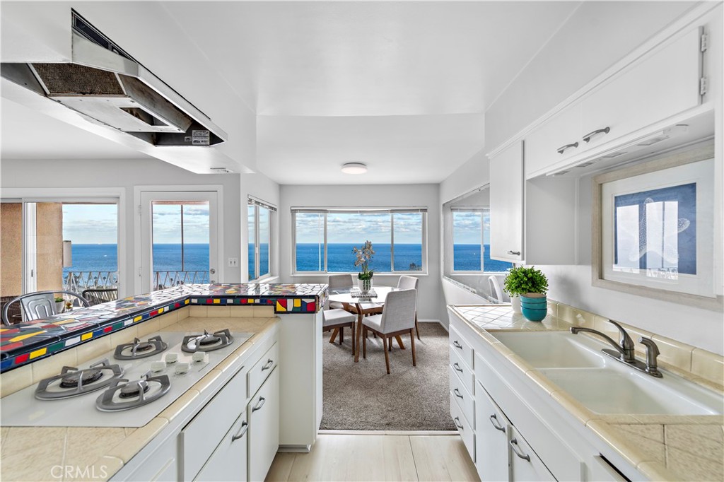 Kitchen looking to the views. - 21722 Ocean Vista Drive F, Laguna Beach CA 92651 - photo 6