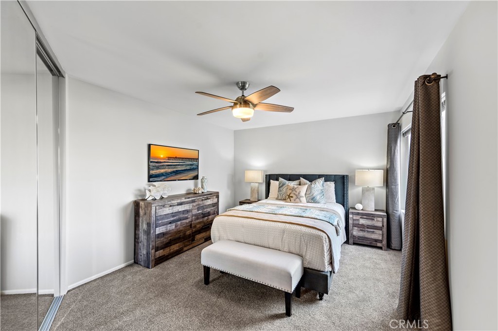 Primary bedroom with walk in closet. - 21722 Ocean Vista Drive F, Laguna Beach CA 92651 - photo 9