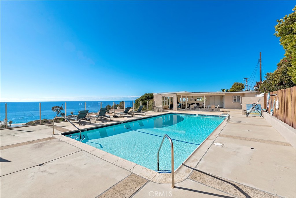 Pool has views overlooking Aliso creek and beach. - 21722 Ocean Vista Drive F, Laguna Beach CA 92651 - photo 17