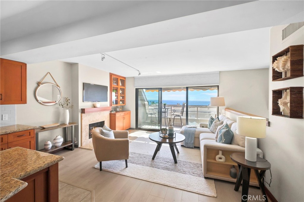 Ocean Views from the living room, Dining room and the kitchen which was opened up and remodeled in 2013. - 21771 Ocean Vista Drive 29, Laguna Beach CA 92651 - photo 2