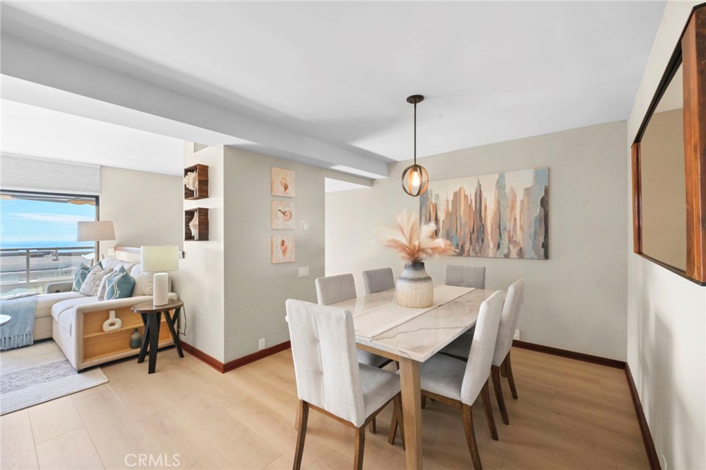 The formal dining room is off the kitchen and living room space. - 21771 Ocean Vista Drive 29, Laguna Beach CA 92651 - photo 8