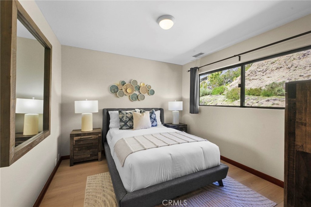 This room was added during the remodel, located on the top floor, with a full bath located just outside the bedroom door - 21771 Ocean Vista Drive 29, Laguna Beach CA 92651 - photo 12