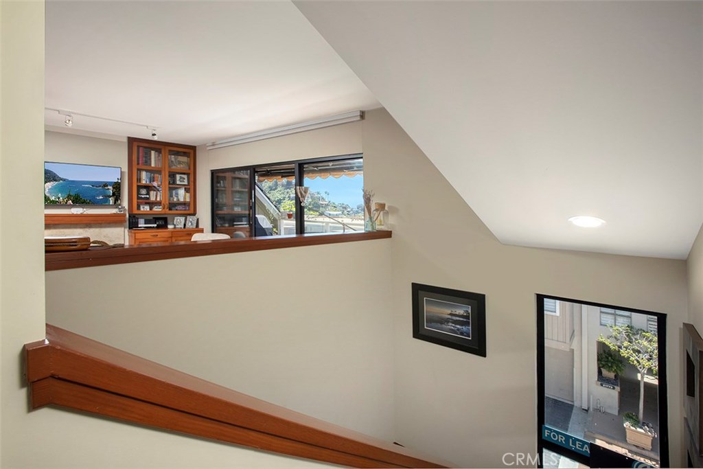 Staircase leading up to the 3rd-main floor. - 21771 Ocean Vista Drive 29, Laguna Beach CA 92651 - photo 14