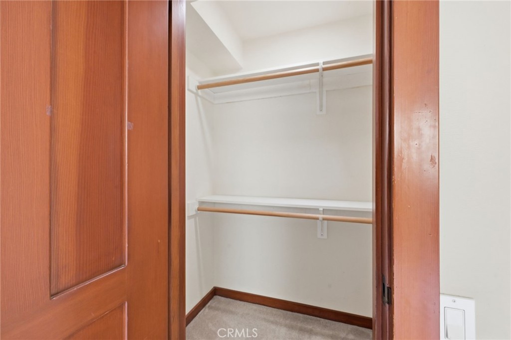 The walk-in closet in the 2nd bedroom. - 21771 Ocean Vista Drive 29, Laguna Beach CA 92651 - photo 26