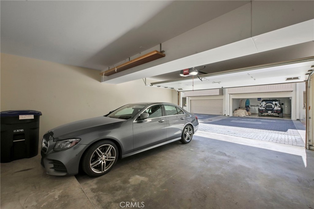 Spacious 2 car garage with storage closet and storage space on the right side of the garage. - 21771 Ocean Vista Drive 29, Laguna Beach CA 92651 - photo 29