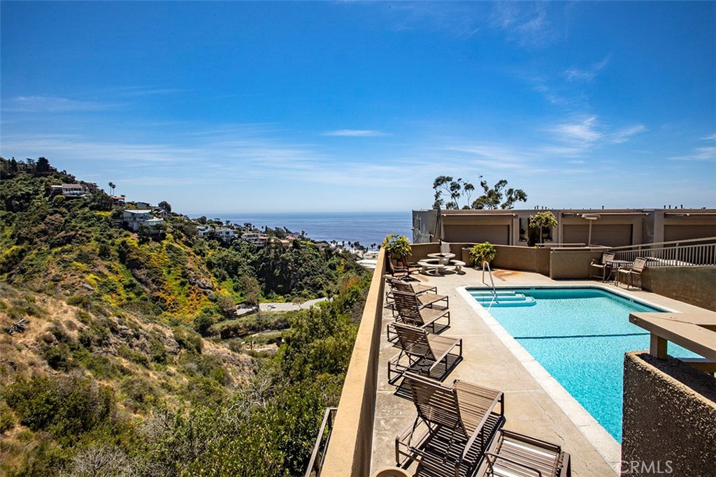 A peek at the canyon and the beach below. - 21771 Ocean Vista Drive 29, Laguna Beach CA 92651 - photo 34