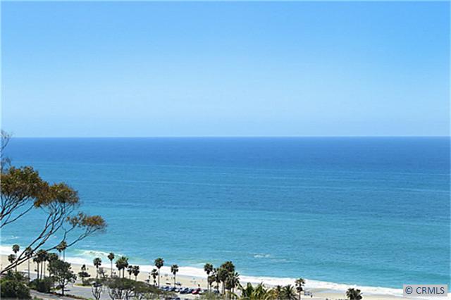 Unobstructed whitewater and sunset views are enjoyed from this condo. - 21785 OCEAN VISTA Drive, Laguna Beach CA 92651 - photo 1