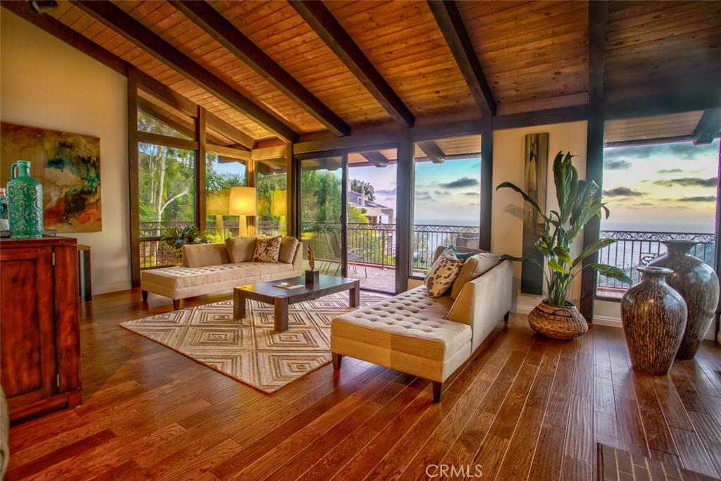 Beautiful Panoramic Ocean Views with Extremely Private Location. Wood Beam Ceiling and Wood floors in Living Room - 22191 Paseo Del Sur, Laguna Beach CA 92651 - photo 1