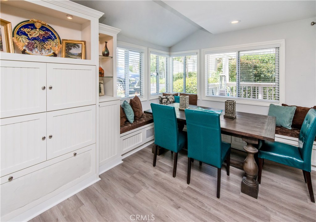Bright beautiful dining area shows ceiling detail and custom built-in hutch with accent lights. Custom seating area. Wai - 222 Santa Rosa Court, Laguna Beach CA 92651 - photo 2
