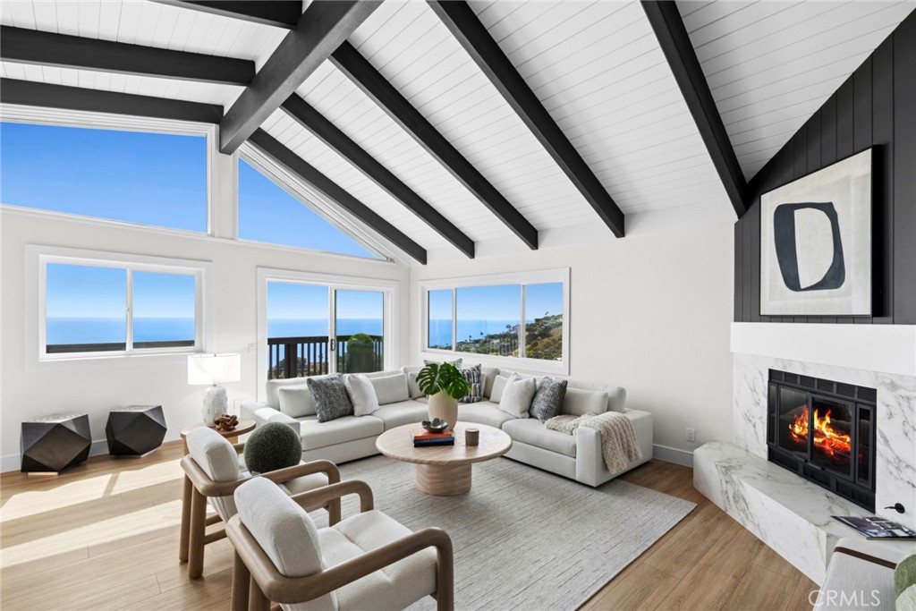 Magical is the only word for it. A front-row seat to vibrant sunsets behind Catalina Island, coastline views stretching - 22332 Eagle Rock Way, Laguna Beach CA 92651 - photo 1