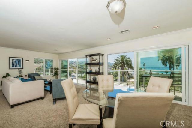 Enjoy watching the surf, beach volleyball and magnificent ocean views from the living room or deck. - 224 Cliff Drive, Laguna Beach CA 92651 - photo 1