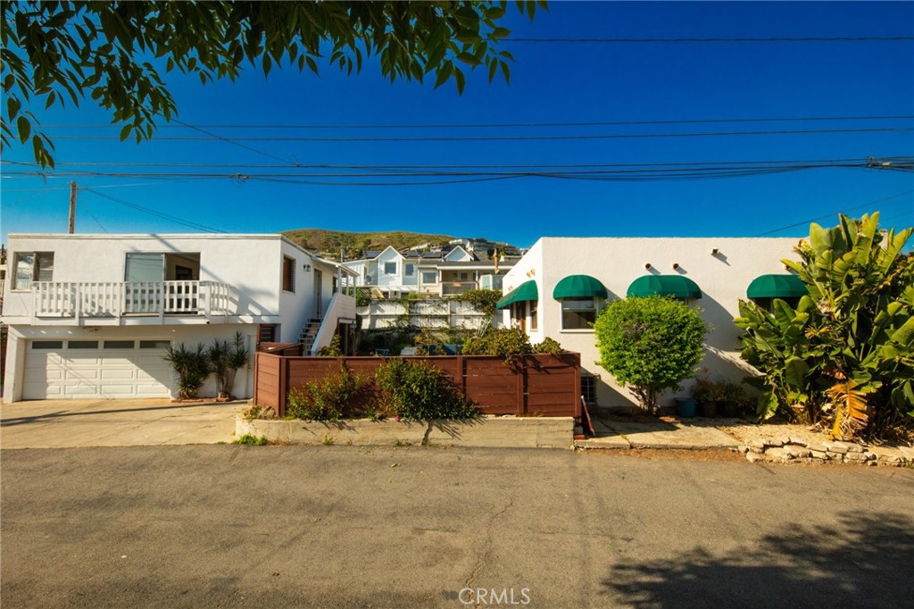 Street to street lot. Front and back unit with garage displayed here from the ally - 226 Chiquita Street, Laguna Beach CA 92651 - photo 1