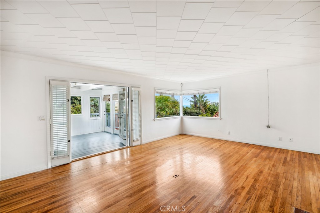 Livingroom and sunroom - 227 Ledroit Street, Laguna Beach CA 92651 - photo 7