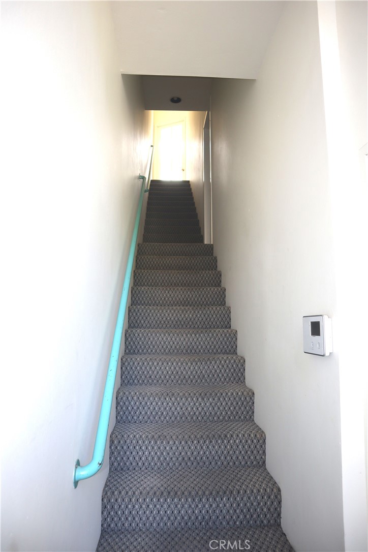 Stairs to upper apartment with view of hillside. - 2375 Laguna Canyon Road, Laguna Beach CA 92651 - photo 7